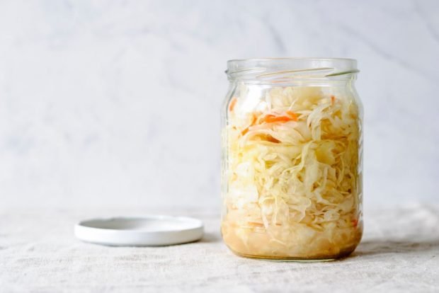 Crispy sauerkraut in a jar for winter