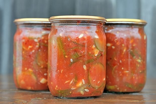 Cucumbers in tomato paste for winter