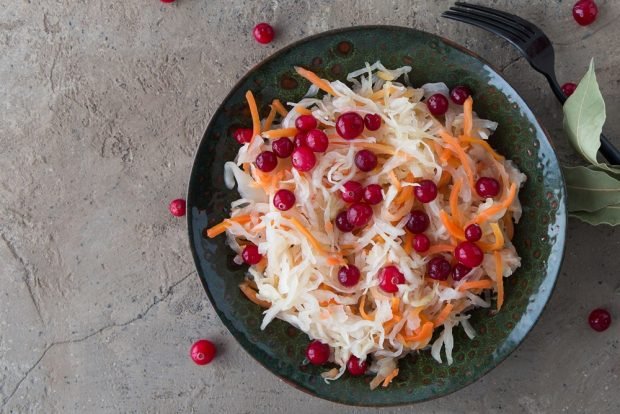 Sauerkraut with lingonberries for winter