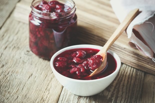 Thick raspberry jam with whole berries 