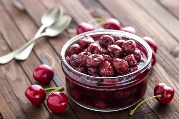 Thick cherry jam with whole berries and seeds