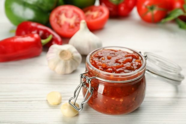 Tomato adjika with horseradish and garlic without cooking