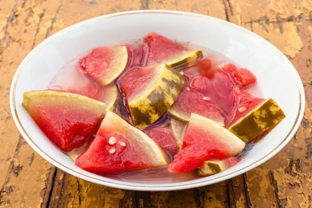 Salted watermelons whole in a barrel for the winter