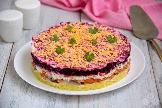 Herring under a fur coat with crab sticks